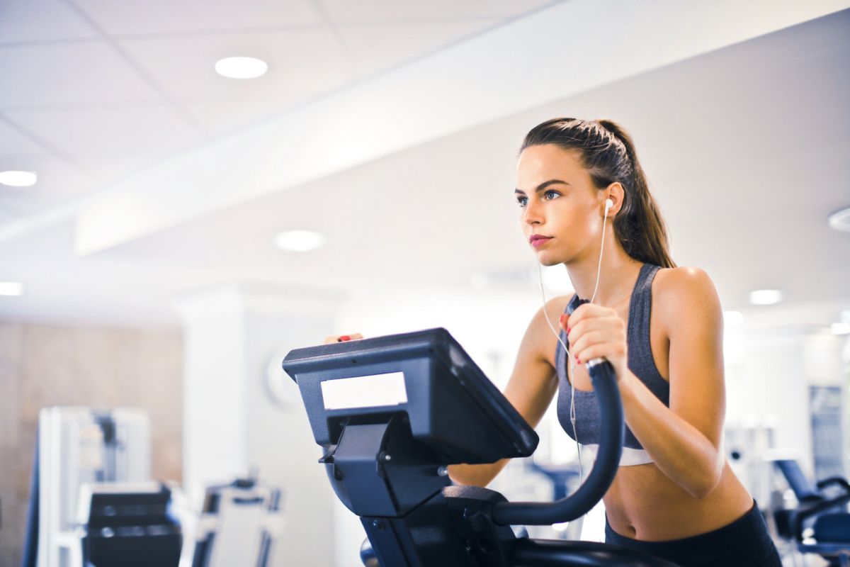 Focused cardio training in a bright studio
